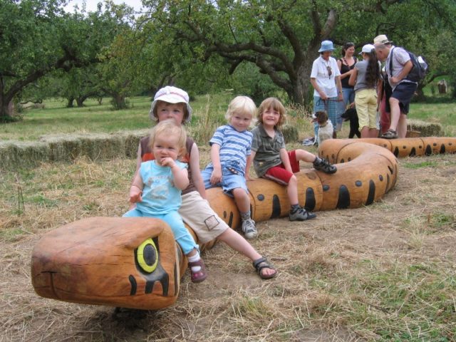 the "snake" a Steve Portchmouth sculptural bench, with children sitting on it