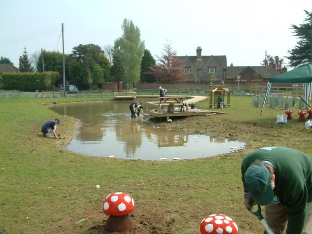 volunteers planting a new wildlife area