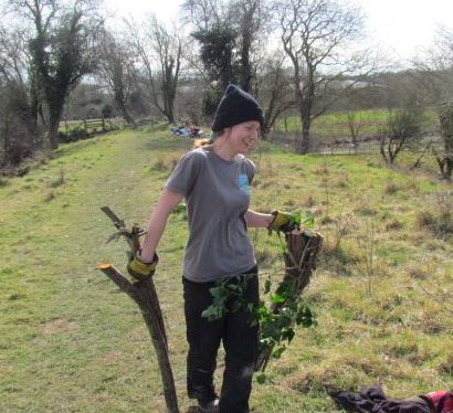 Volunteer Katie constructing a hibernaculum at Hambrook embankment