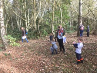 children enjoying art event in woods