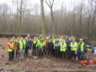 group shot of helpers in Dering Wood woodland