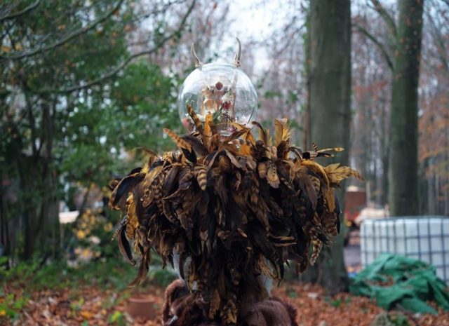 Maureen Jordan sculpture made of feather, skull, fur and glass bowl