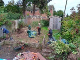 volunteers doing garden work