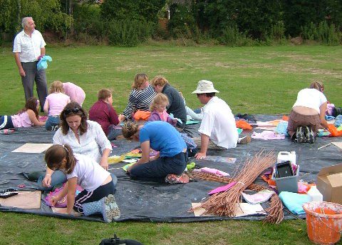 A children's art activity in a park