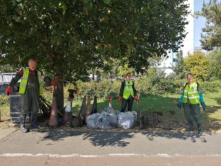 Volunteers + bags of litter