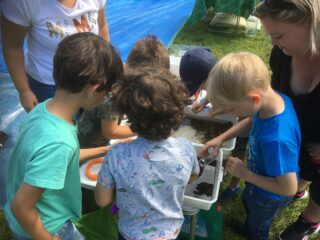 school children river dippers